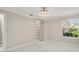 This bedroom has updated flooring, closet, and lighting at 11863 Delfina Ln, Orlando, FL 32827