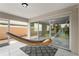 Comfortable screened patio with hammock and view of the home's interior at 11863 Delfina Ln, Orlando, FL 32827