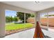 Screened patio featuring a hammock and view of the lake at 11863 Delfina Ln, Orlando, FL 32827