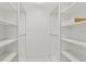 This walk-in closet features custom shelving and ample storage space at 11863 Delfina Ln, Orlando, FL 32827