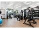 Fitness center featuring a variety of modern weight machines and plenty of natural light at 11944 Sunsail Ave, Orlando, FL 32832