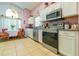 Bright kitchen featuring stainless steel appliances and breakfast nook at 131 Country Creek Ln, Kissimmee, FL 34746