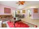 Open-concept living and dining area, with comfortable seating and tile floors at 131 Country Creek Ln, Kissimmee, FL 34746