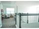 Spacious upstairs living area features comfortable seating and lots of natural light at 1340 Blue Stem Ln, Winter Park, FL 32792