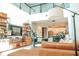 Bright living room featuring a loft, comfortable seating, and neutral tones at 1340 Blue Stem Ln, Winter Park, FL 32792