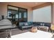 Outdoor patio with grill, comfortable seating, and a stylish wicker table at 1340 Blue Stem Ln, Winter Park, FL 32792