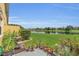 Beautiful backyard with lush lawn, a tranquil lake view, and a patio perfect for relaxing at 13480 Applerose Ln # 19, Orlando, FL 32824