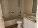 Standard bathroom featuring a tub/shower combination, vanity with sink, and toilet at 144 Costa Mesa Dr, Lady Lake, FL 32159