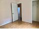 Bedroom featuring laminate flooring, window and closet at 144 Costa Mesa Dr, Lady Lake, FL 32159