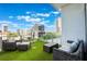 Inviting balcony with stylish patio furniture and city views creates an ideal spot for relaxation and outdoor enjoyment at 150 E Robinson St # 626, Orlando, FL 32801