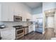 Bright kitchen featuring white cabinets, stainless steel appliances, and modern countertops at 150 E Robinson St # 626, Orlando, FL 32801