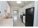 Bright kitchen features modern appliances, ample cabinet space, and stylish countertops at 1505 W Lake Cannon Nw Dr, Winter Haven, FL 33881