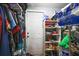 Walk-in closet with shelving and hanging storage at 1508 Roger Babson Rd, Orlando, FL 32808