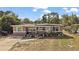 Charming single-story home with a cozy front yard and a welcoming entrance at 1508 Roger Babson Rd, Orlando, FL 32808