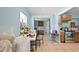 Living room area with table, chairs, and decor at 1508 Roger Babson Rd, Orlando, FL 32808