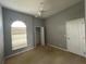 Bedroom featuring vaulted ceilings, natural light, and neutral walls ready for decor at 151 Prestwick Dr, Davenport, FL 33897