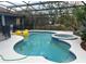 Inviting screened-in pool area with a spa and outdoor living space, perfect for relaxing and entertaining at 151 Prestwick Dr, Davenport, FL 33897