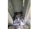 Small storage space with overhead shelf and view of the floor at 1620 Grand St, Orlando, FL 32805