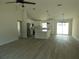 Open-concept living space featuring recessed lighting and bright kitchen at 16648 Sw 25Th Ct, Ocala, FL 34473