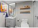 Bathroom featuring floating shelves, a square sink, a toilet with a bidet, and a glass shower at 170 Lago Vista Blvd, Casselberry, FL 32707