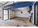 Spacious garage featuring storage cabinets, white walls, and an overhead door, offering functionality and convenience at 170 Lago Vista Blvd, Casselberry, FL 32707