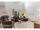 Bright living room with a soaring ceiling, wood-look floors and an abundance of natural light at 170 Lago Vista Blvd, Casselberry, FL 32707