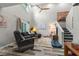 Bright living room with a soaring ceiling, wood-look floors and an abundance of natural light at 170 Lago Vista Blvd, Casselberry, FL 32707