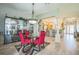 Open dining area with modern chandelier, perfect for entertaining at 17567 Se 81St Parnassus Ct, The Villages, FL 32162