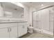 Modern bathroom featuring a dual sink vanity and glass enclosed shower at 1797 Red Canyon Dr, Kissimmee, FL 34744