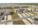 New construction townhomes with attached garages and long driveways at 1797 Red Canyon Dr, Kissimmee, FL 34744