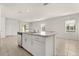 Contemporary kitchen with an island and stainless steel dishwasher at 1797 Red Canyon Dr, Kissimmee, FL 34744