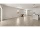 Bright, open living area with tile flooring, natural light, and neutral walls at 1797 Red Canyon Dr, Kissimmee, FL 34744