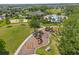 Aerial view of community playground featuring slides, swings, and other play structures at 1797 Red Canyon Dr, Kissimmee, FL 34744