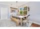 Eat-in-kitchen with bench seating and stylish décor at 1837 Sweetwater West Cir, Apopka, FL 32712