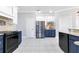 Modern kitchen features stainless steel appliances and updated cabinetry at 1837 Sweetwater West Cir, Apopka, FL 32712