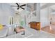 Spacious living room with large windows and staircase at 1837 Sweetwater West Cir, Apopka, FL 32712