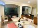 Bright kitchen with a view to the living room boasts wood cabinets and modern appliances at 211 Hunt St, Clermont, FL 34711