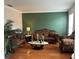 Elegant living room with ornate furnishings and hardwood floors at 211 Hunt St, Clermont, FL 34711