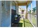 Cozy screened balcony with seating and outdoor views at 2304 Silver Palm Dr # 304, Kissimmee, FL 34747
