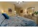 Comfortable bedroom with matching nightstands, lamps, and a unique bedspread at 2304 Silver Palm Dr # 304, Kissimmee, FL 34747