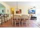 Dining room with a large table, TV and an open concept feel at 2304 Silver Palm Dr # 304, Kissimmee, FL 34747