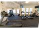 Fitness center featuring treadmills, elliptical machines, weight machines, and several large windows at 2304 Silver Palm Dr # 304, Kissimmee, FL 34747