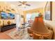 Bright living room featuring stylish decor, tile flooring, and abundant natural light at 2304 Silver Palm Dr # 304, Kissimmee, FL 34747