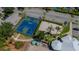 Aerial view of the basketball and volleyball courts with lounging area; offers recreation for all at 2304 Silver Palm Dr # 304, Kissimmee, FL 34747