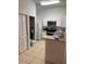 Functional kitchen with white cabinets, modern appliances, and a convenient breakfast bar at 2882 Club Cortile Cir # B, Kissimmee, FL 34746