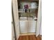 A practical laundry closet with a washer and dryer, maximizing space and convenience at 2882 Club Cortile Cir # B, Kissimmee, FL 34746