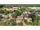 Neighborhood aerial view showcases homes and community areas with mature trees at 2921 Bon Air Dr, Orlando, FL 32818