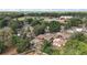 An aerial view shows the layout of the neighborhood with mature trees and landscaping at 2921 Bon Air Dr, Orlando, FL 32818