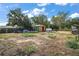 Over-sized backyard boasts shed, and ample space for outdoor activities, ideal for storage, workshop, or hobbies at 2921 Bon Air Dr, Orlando, FL 32818