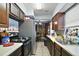 Traditional kitchen with stainless steel appliances and dining area at 2921 Bon Air Dr, Orlando, FL 32818